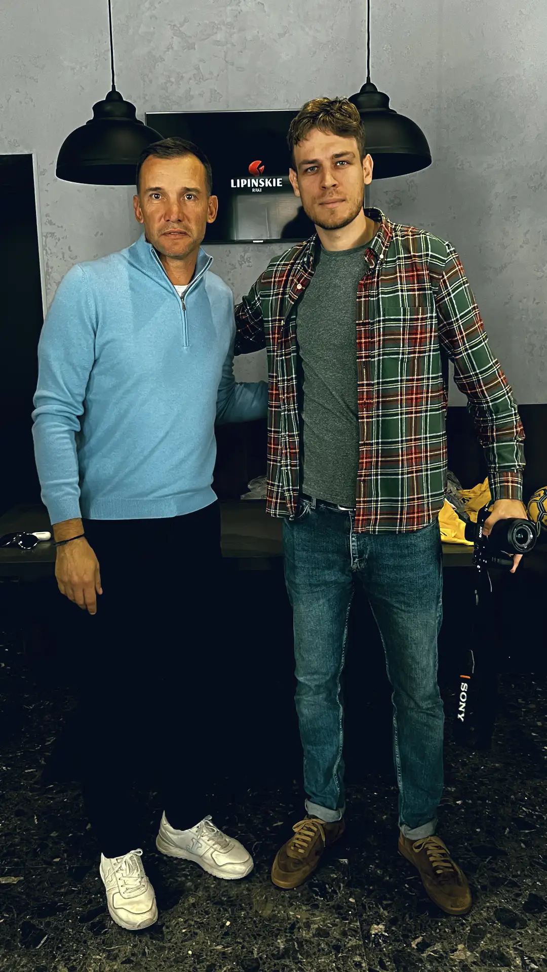 Alex Melnykov with athletes and production partners